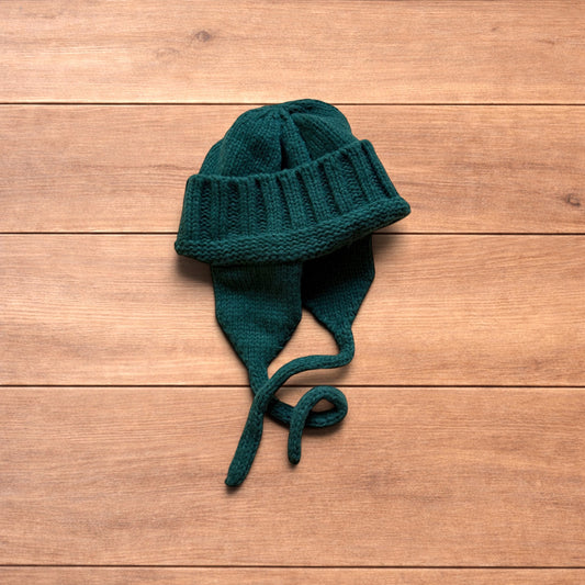 Vintage style dappy ear flap bobble hat in dark green.