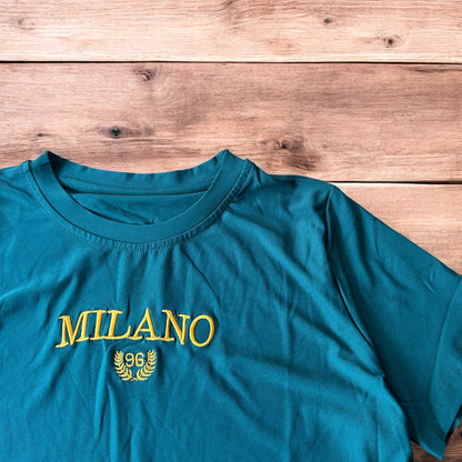 Lovely Milano top T-shirt in cyan blue with gold embroidery.