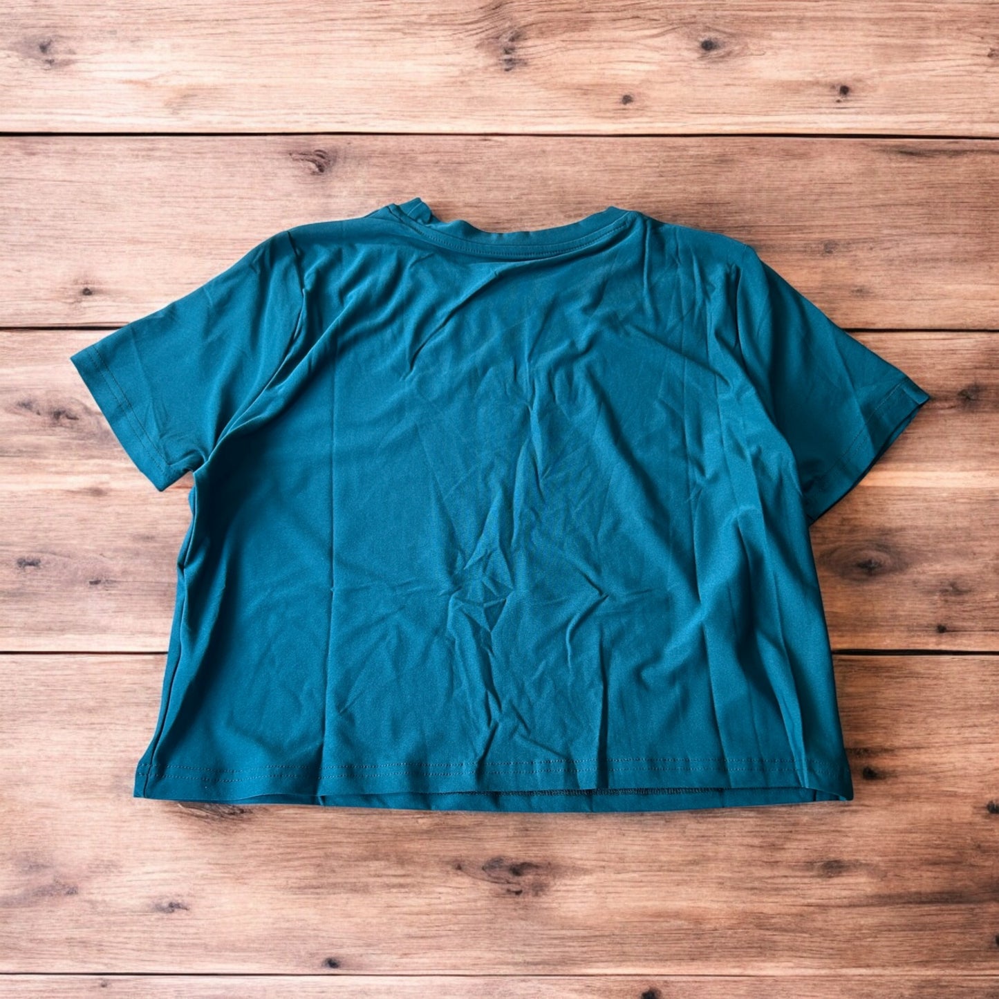 Lovely Milano top T-shirt in cyan blue with gold embroidery.