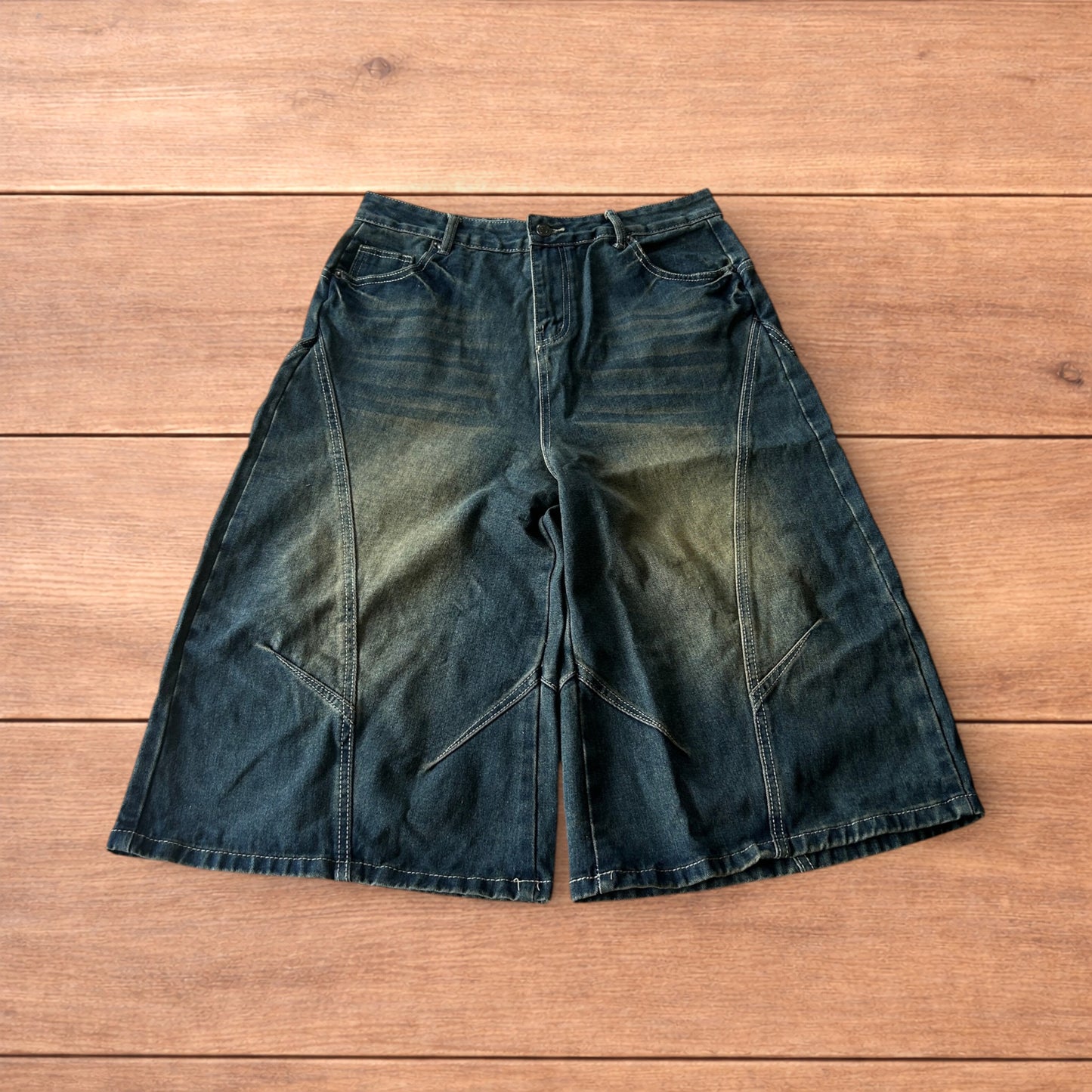 Super baggy wide leg denim carpenter shorts jorts in dark blue wash.