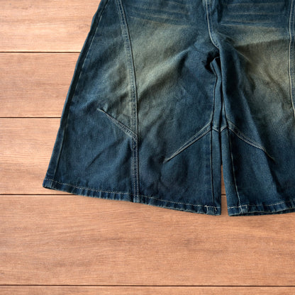 Super baggy wide leg denim carpenter shorts jorts in dark blue wash.