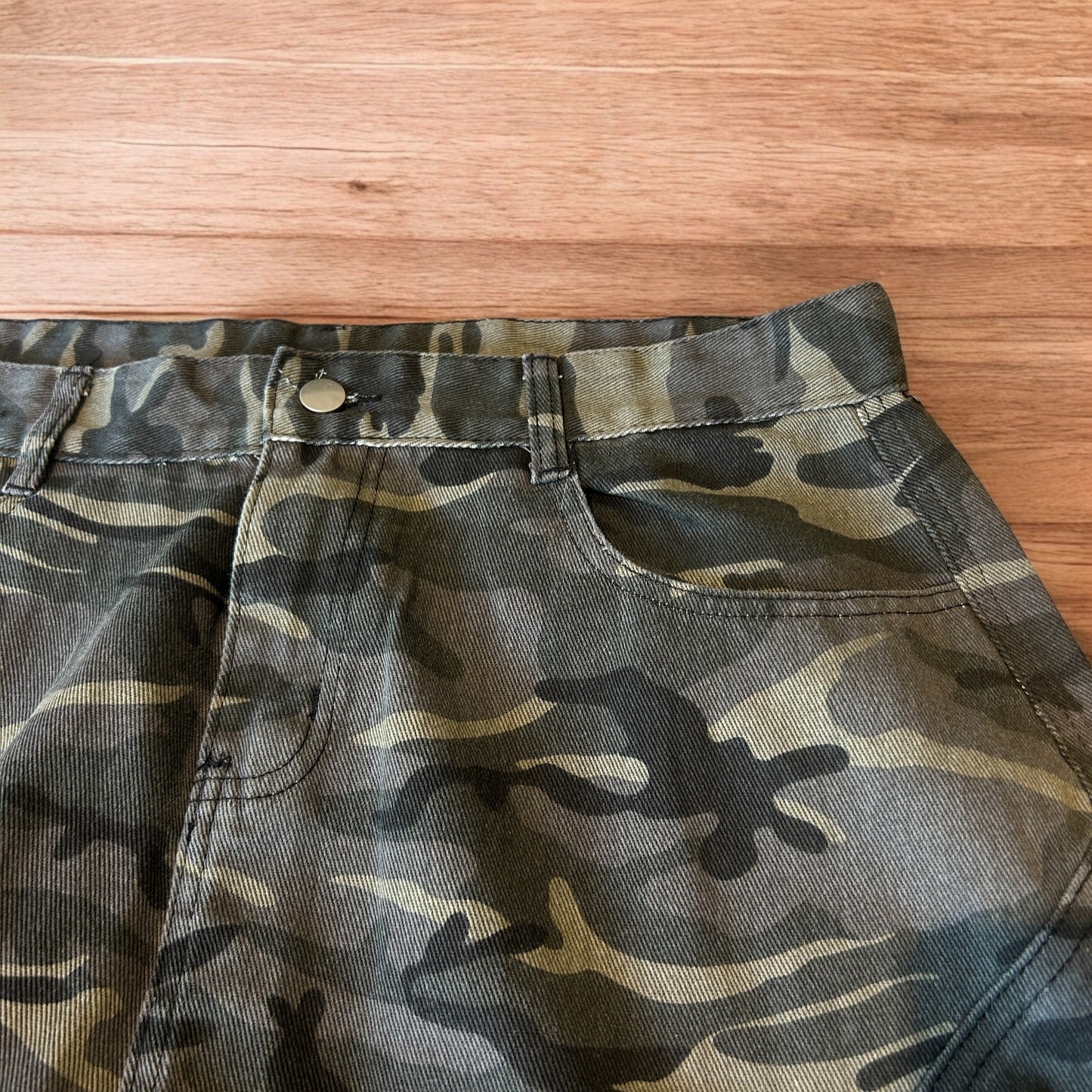 Super baggy wide leg cargo carpenter trousers in army camo.