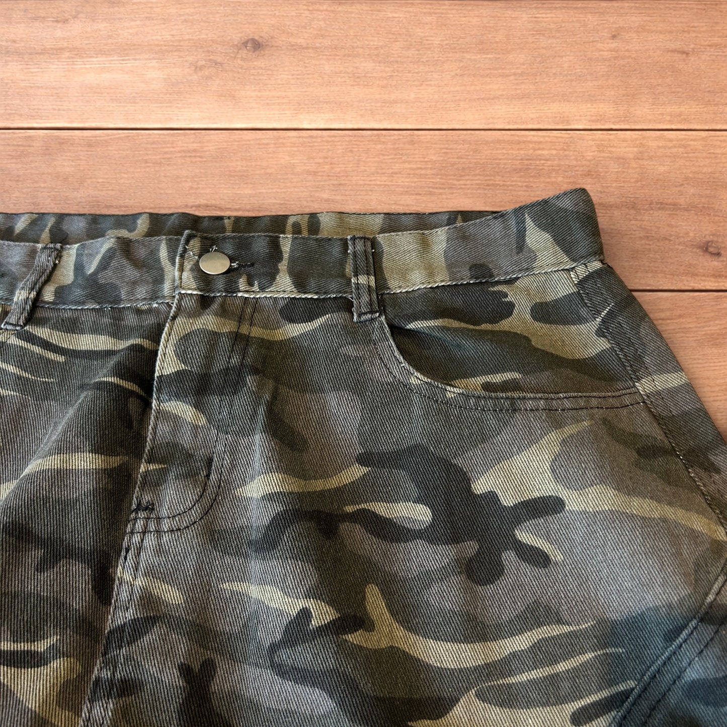 Super baggy wide leg cargo carpenter trousers in army camo.