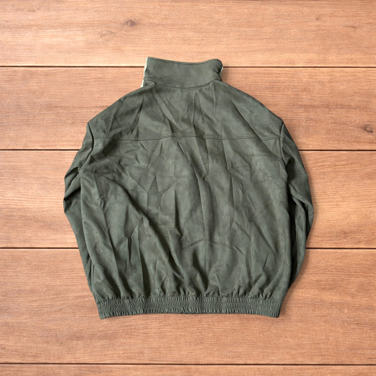 Japanese style zip up track jacket in khaki green with pale green stripes on sleeves and knotted loop front fastenings.