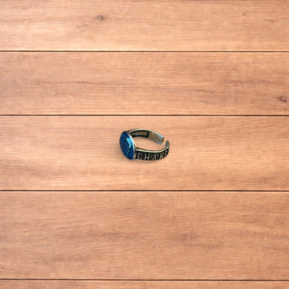 Vintage style stainless steel Bonne Chance ring in silver/ blue.