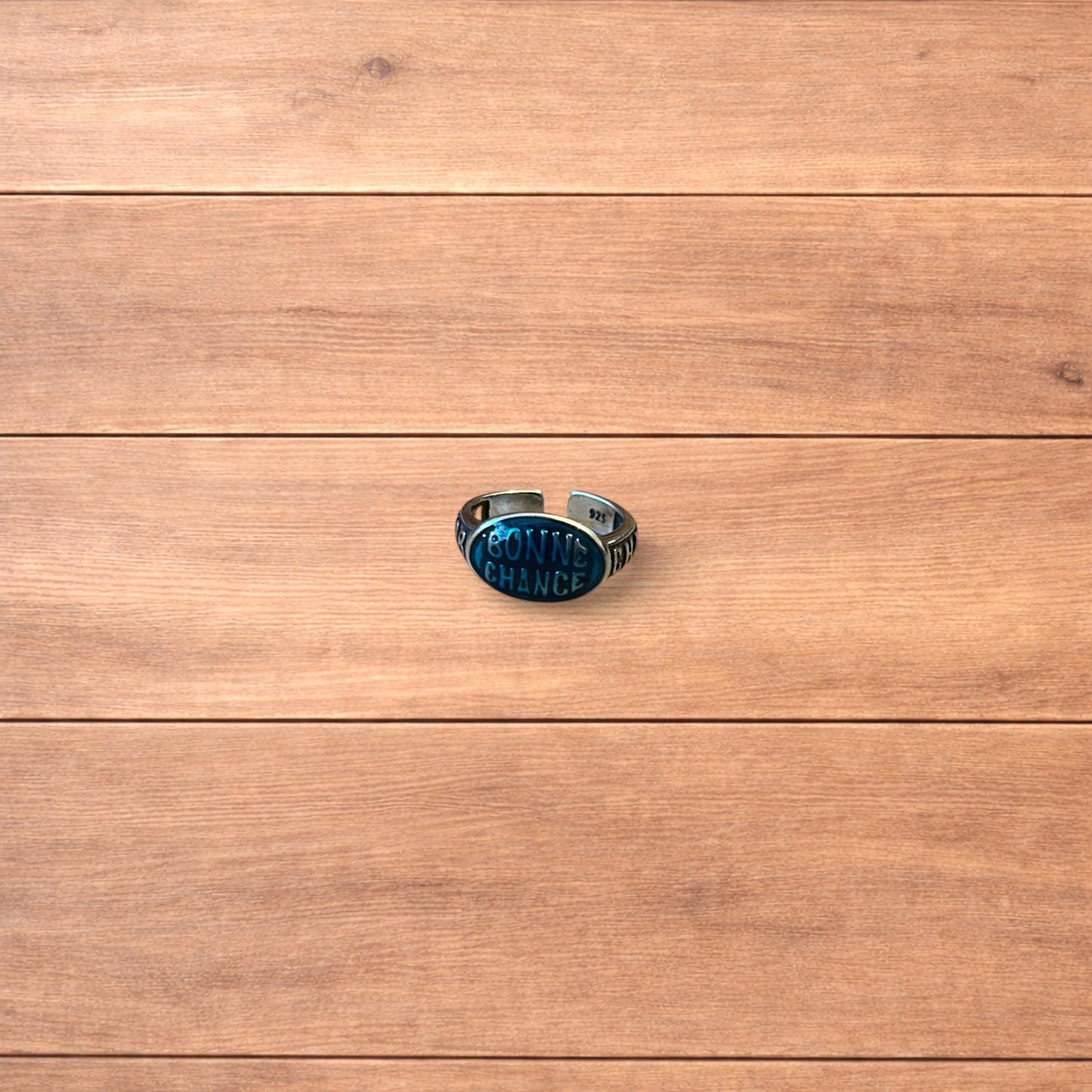 Vintage style stainless steel Bonne Chance ring in silver/ blue.