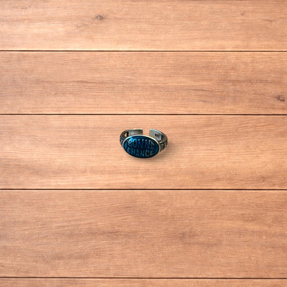 Vintage style stainless steel Bonne Chance ring in silver/ blue.