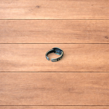 Vintage style stainless steel Bonne Chance ring in silver/ blue.