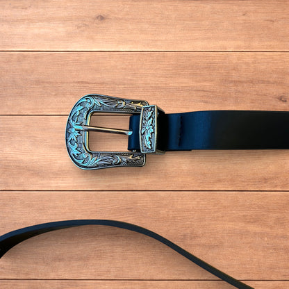 Vintage style faux leather western cowboy belt in black with silver trim.
