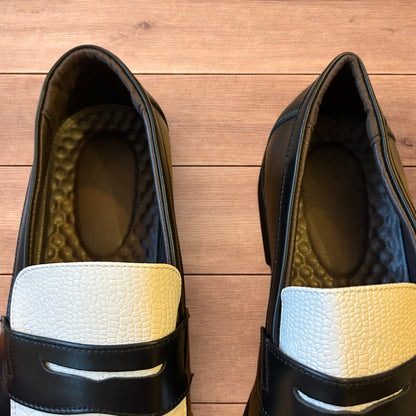 Lovely classic style loafers shoes in black and white design.