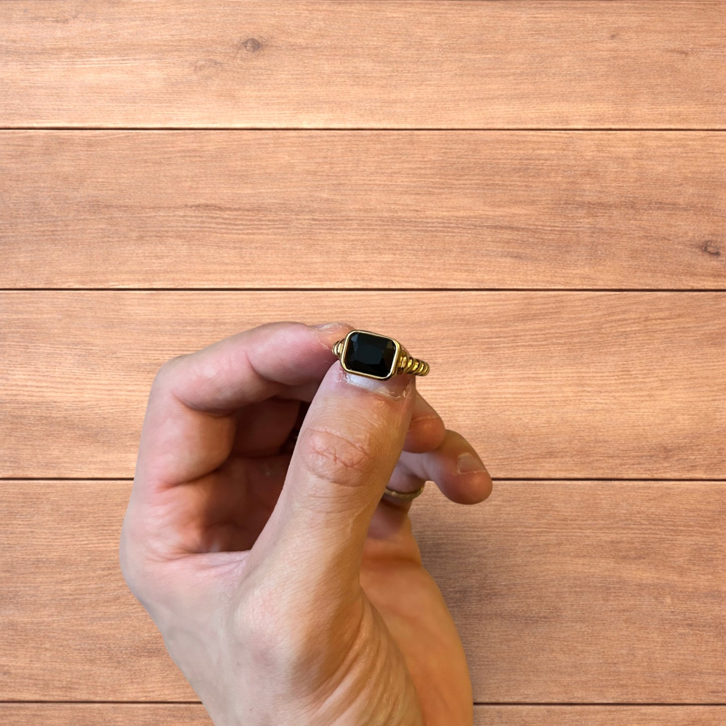 Lovely vintage style gold ring with black gemstone.