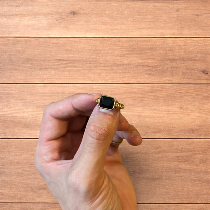 Lovely vintage style gold ring with black gemstone.