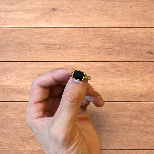 Lovely vintage style gold ring with black gemstone.
