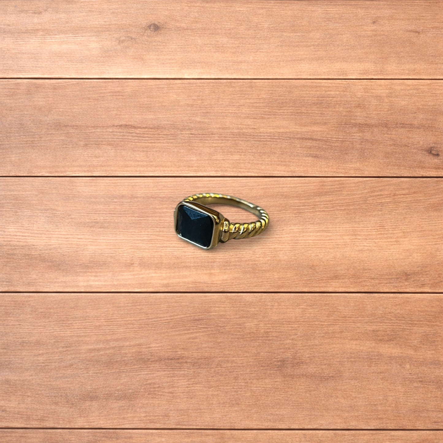 Lovely vintage style gold ring with black gemstone.