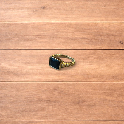 Lovely vintage style gold ring with black gemstone.