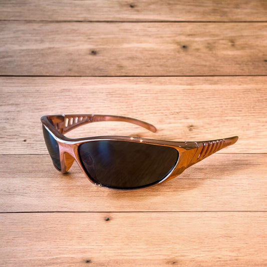 Cool wrap around sunglasses in rose gold frame with black lense. One size.