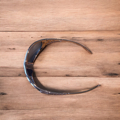 Cool wrap around sunglasses in rose gold frame with black lense. One size.