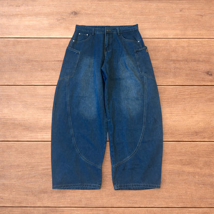 Incredible vintage style baggy wide leg skater fit jeans in mid blue.
