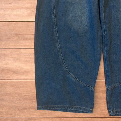 Incredible vintage style baggy wide leg skater fit jeans in mid blue.