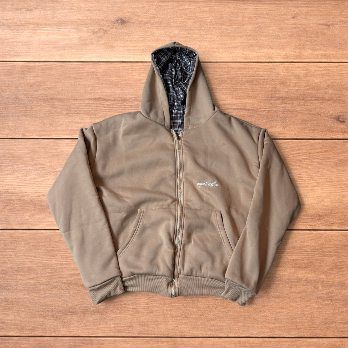Oversized baggy brown zip up hoodie jumper reversible with black and white checkered interior hood.