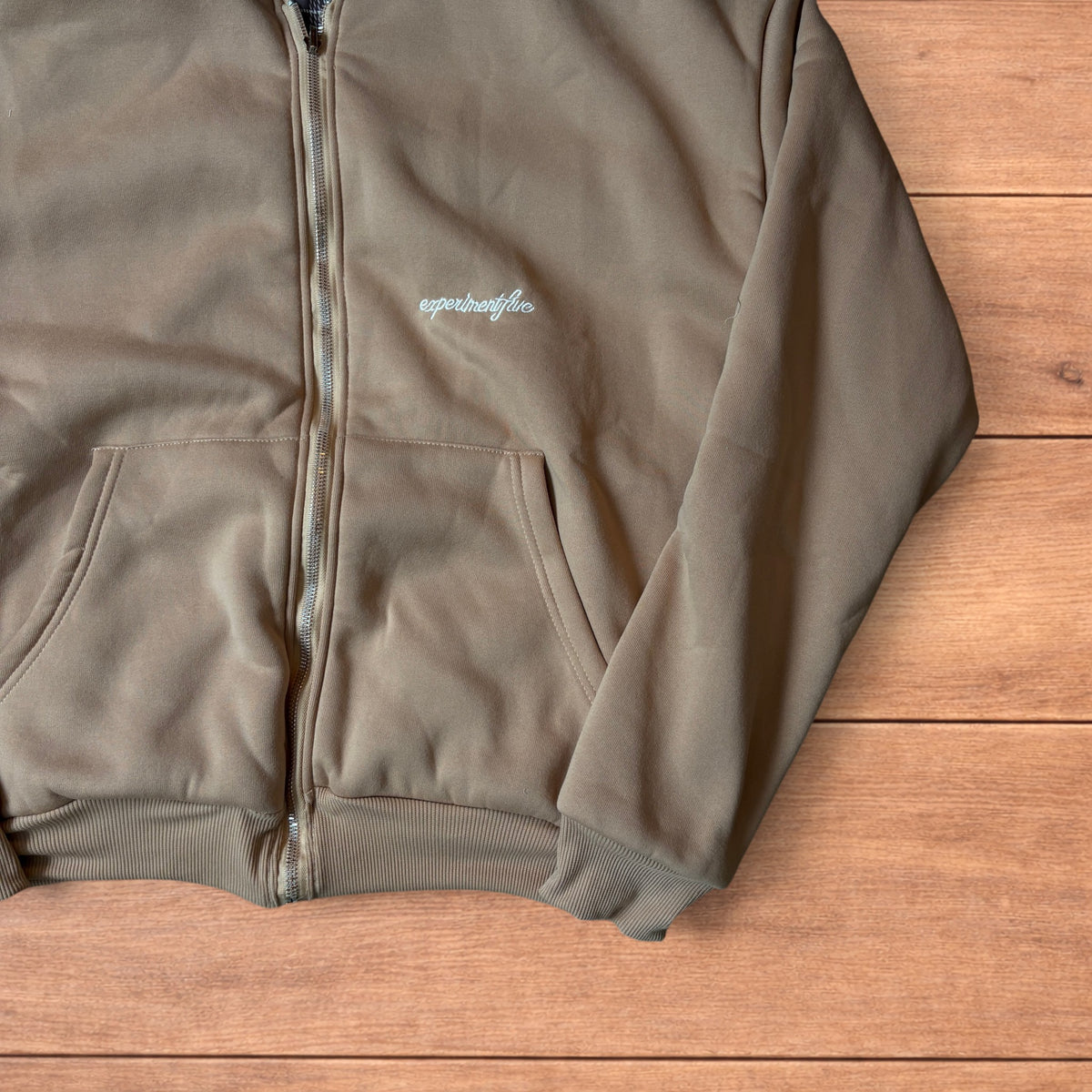 Oversized baggy brown zip up hoodie jumper reversible with black and white checkered interior hood.