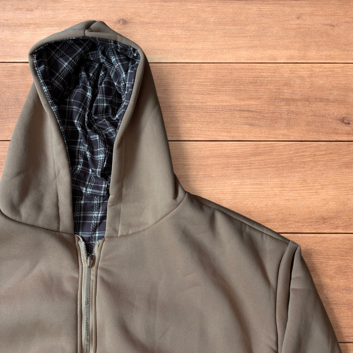 Oversized baggy brown zip up hoodie jumper reversible with black and white checkered interior hood.