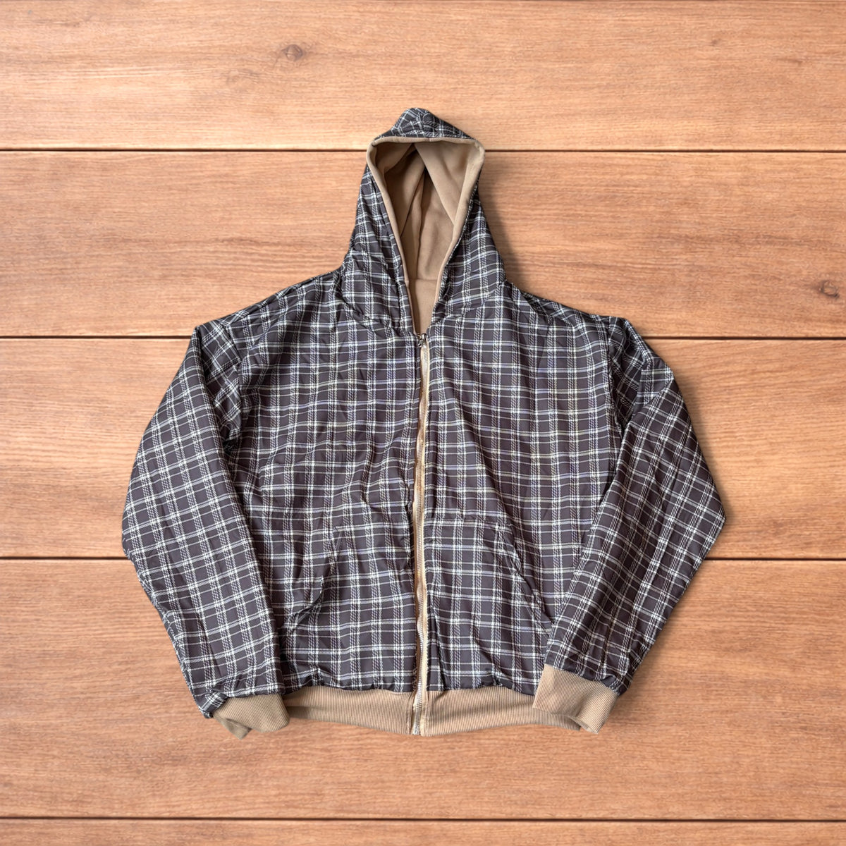 Oversized baggy brown zip up hoodie jumper reversible with black and white checkered interior hood.