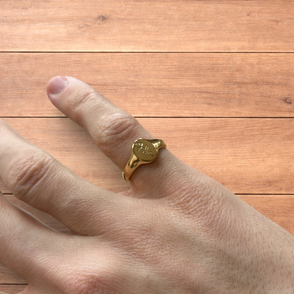 Lovely vintage style signet ring with rose detail in gold.