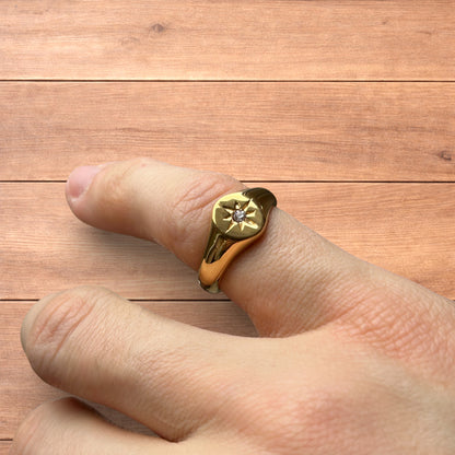 Lovely vintage style signet ring with diamond star detail in gold.