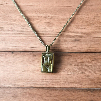Lovely Gold stainless steel necklace of female woman figure silhouette body.