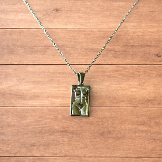 Lovely Gold stainless steel necklace of female woman figure silhouette body.
