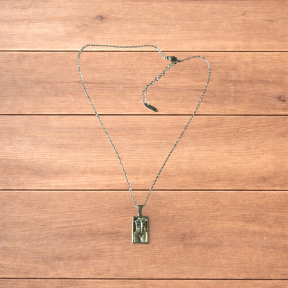 Lovely Gold stainless steel necklace of female woman figure silhouette body.