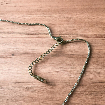 Lovely Gold stainless steel necklace of female woman figure silhouette body.