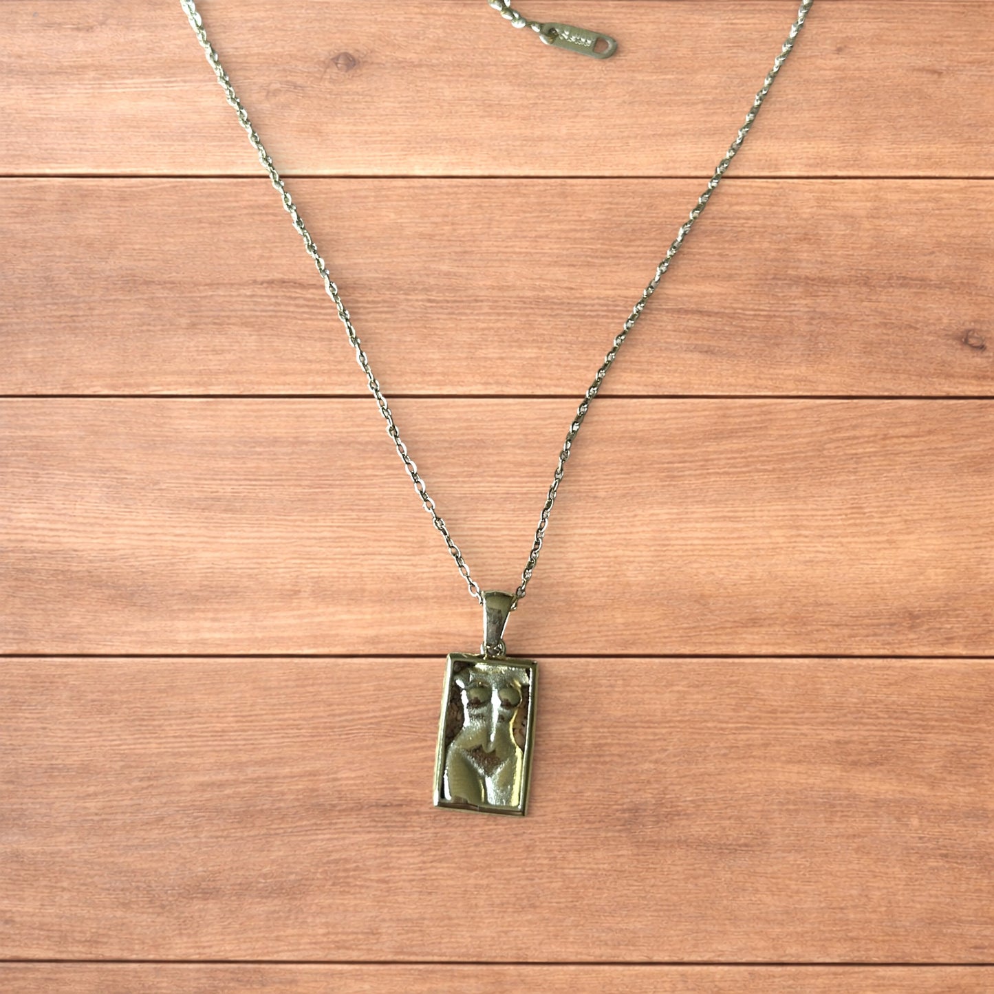 Lovely Gold stainless steel necklace of female woman figure silhouette body.