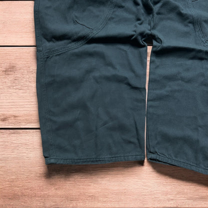 Vintage Military style baggy wide leg cargo trousers in khaki green.