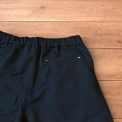 Vintage style baggy wide leg balloon fit tailored trousers in black.