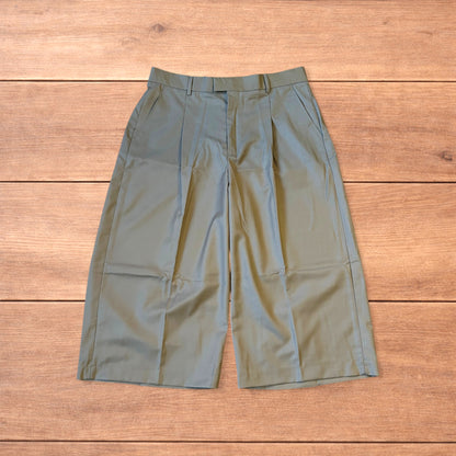 Vintage style baggy wide leg long tailored shorts in beige.