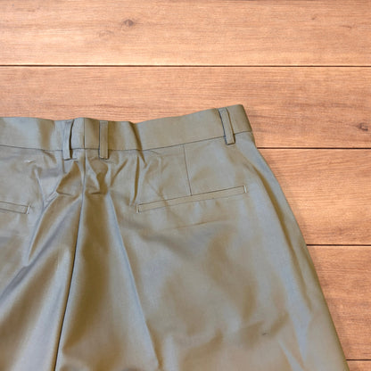 Vintage style baggy wide leg long tailored shorts in beige.