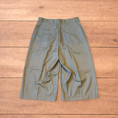 Vintage style baggy wide leg long tailored shorts in beige.