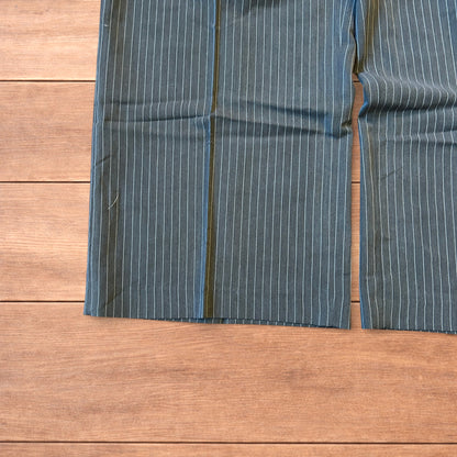 Vintage style baggy wide leg pinstripe tailored trousers in grey.