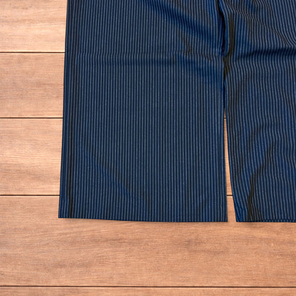 Vintage style baggy wide leg pinstripe tailored trousers in navy blue.