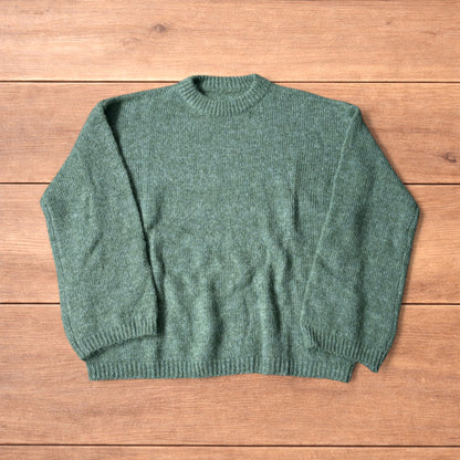 Vintage style knitted sweater jumper in khaki green.
