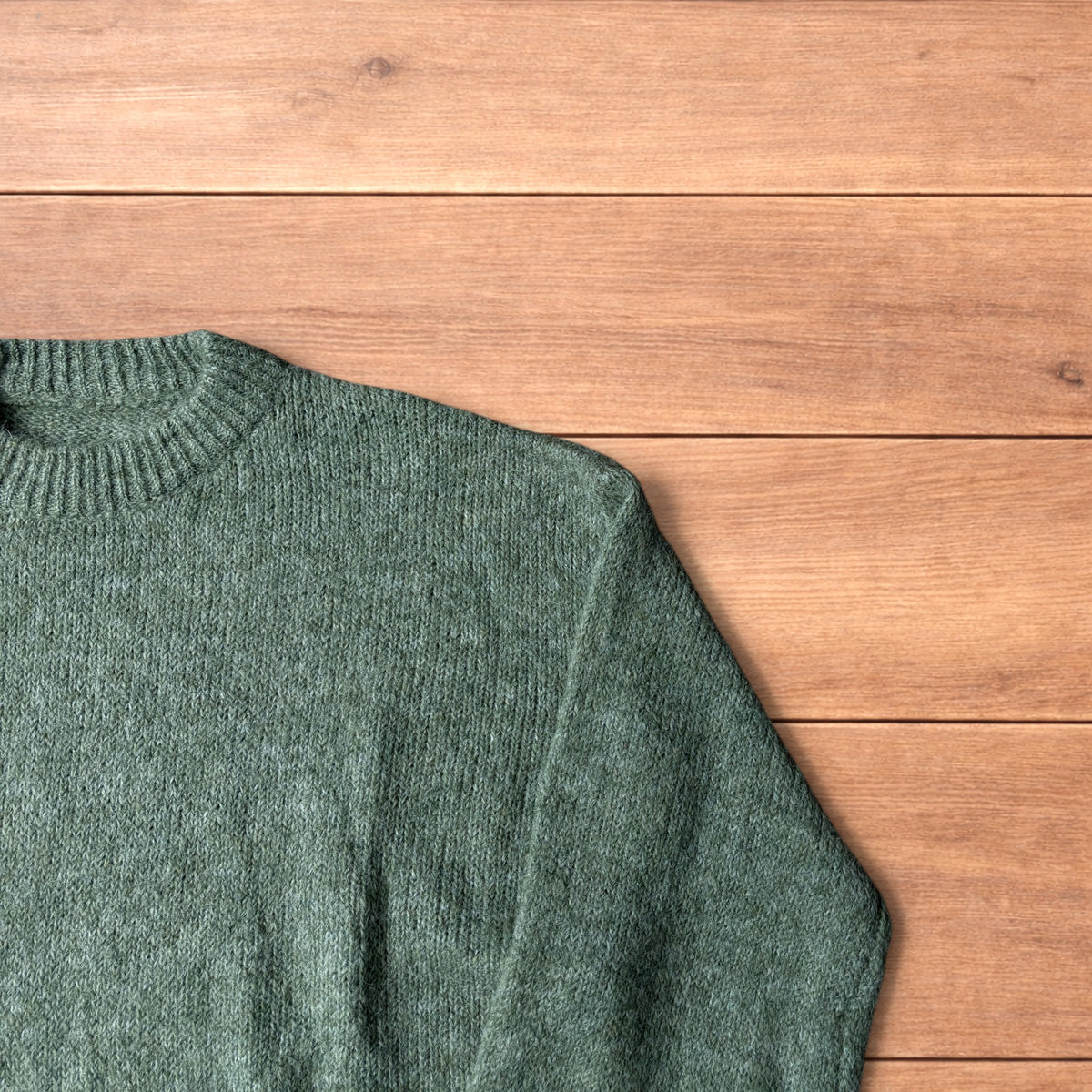 Vintage style knitted sweater jumper in khaki green.