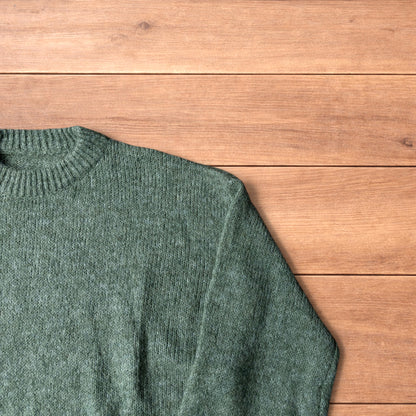 Vintage style knitted sweater jumper in khaki green.