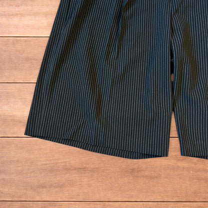 Vintage style baggy wide leg pinstripe tailored shorts jorts in black.