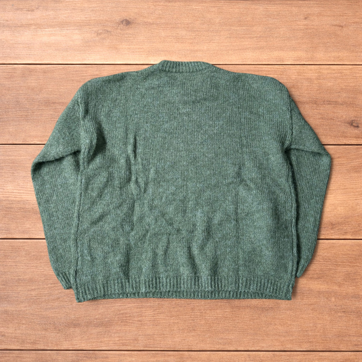 Vintage style knitted sweater jumper in khaki green.
