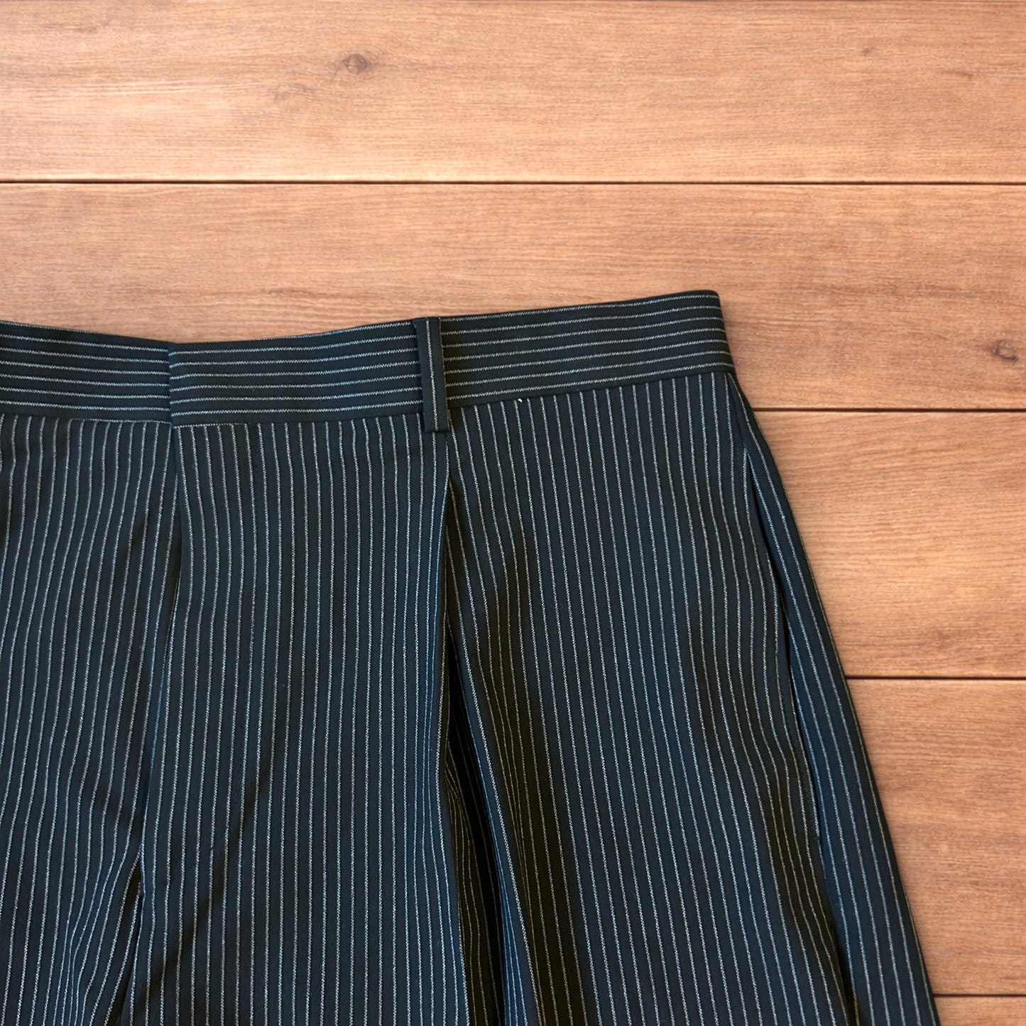 Vintage style baggy wide leg pinstripe tailored shorts jorts in black.