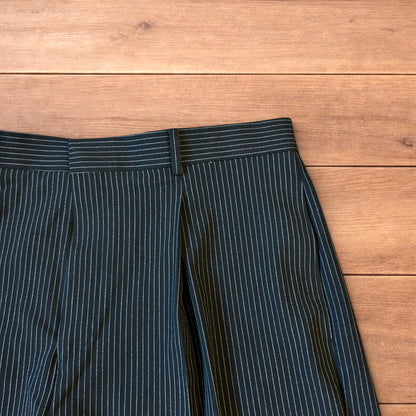 Vintage style baggy wide leg pinstripe tailored shorts jorts in black.