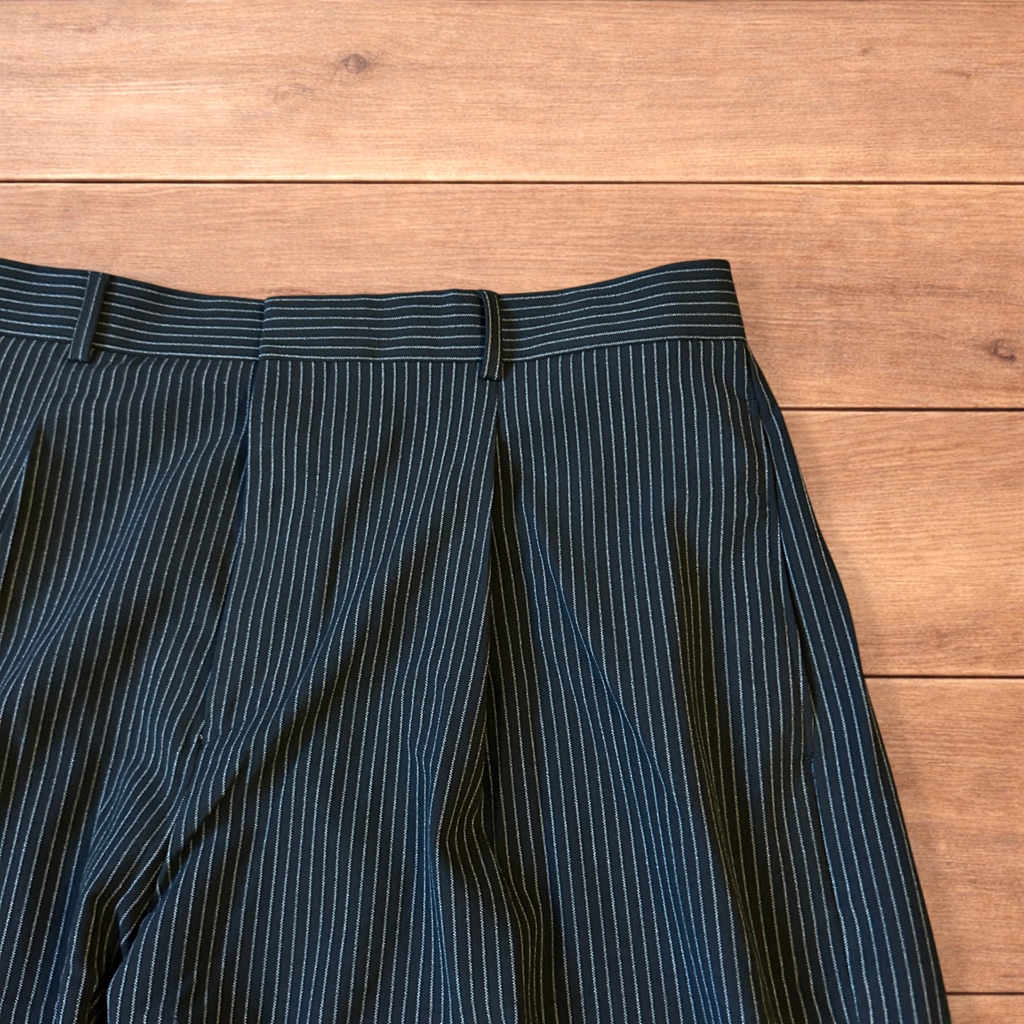 Vintage style baggy wide leg pinstripe tailored trousers in black.