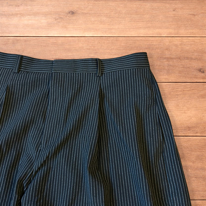 Vintage style baggy wide leg pinstripe tailored trousers in black.
